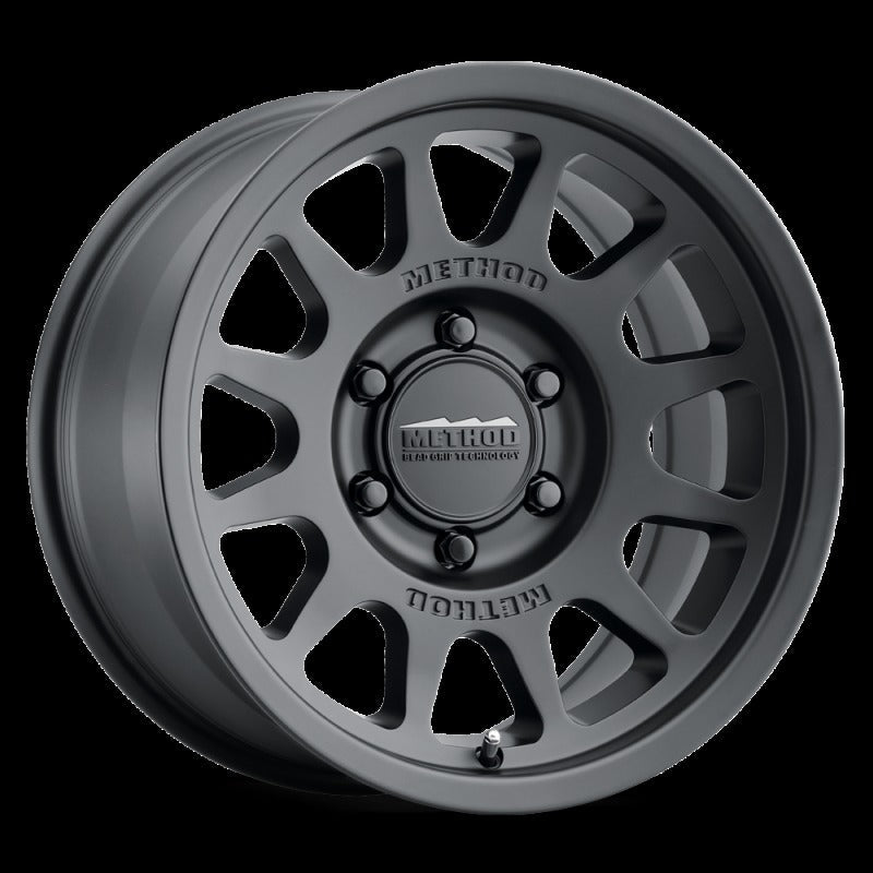 Method MR703 17x8.5 +25mm Offset 6x135 87mm CB Matte Black Wheel