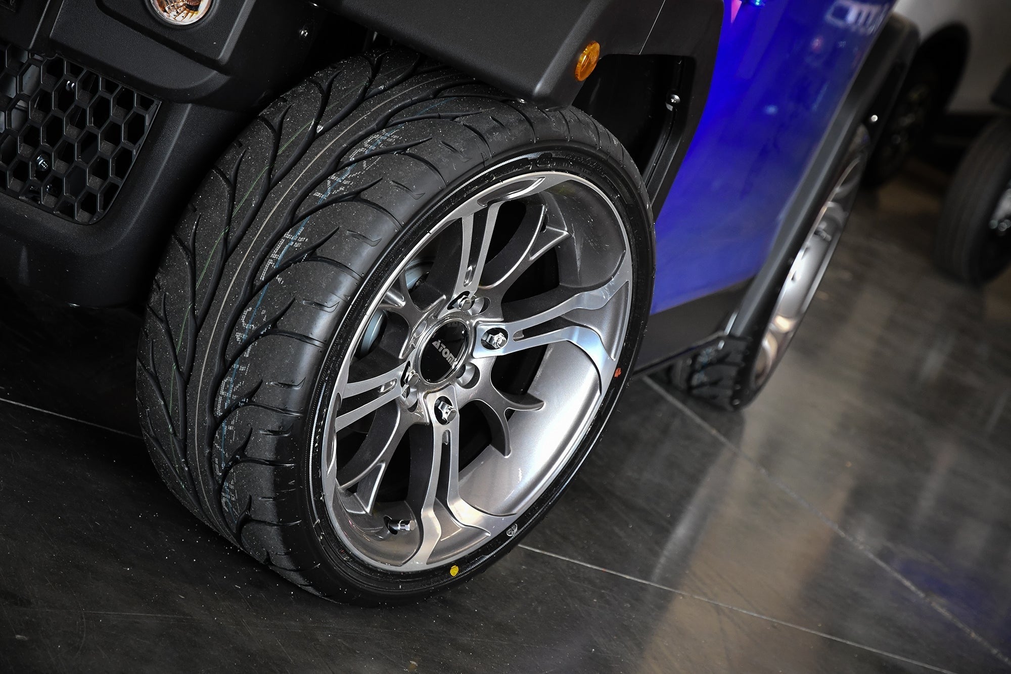 HD Golf Wheel & Tire Package ( 1pc ) 14x7.0 Spinout Gunmetal Machined w ( 1pc ) 205/40-14 All-Season Tire
